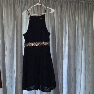 A navy blue dress with diamond decals